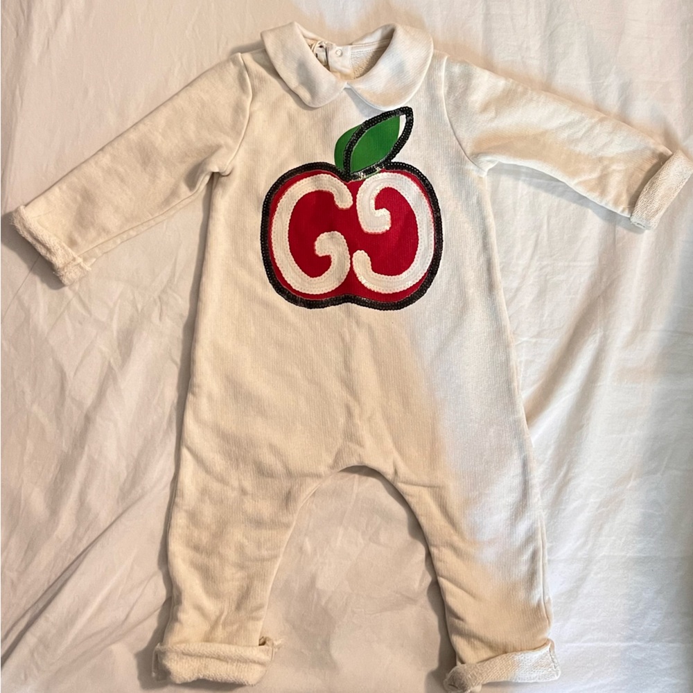 Gucci bodysuit 6-9m